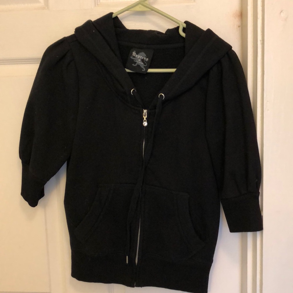 Black. Never worn short jacket. NWOT
